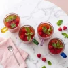 Komplet 2 szklanek ryflowanych Vialli Design Livio, 350 ml, z żółtym uchem